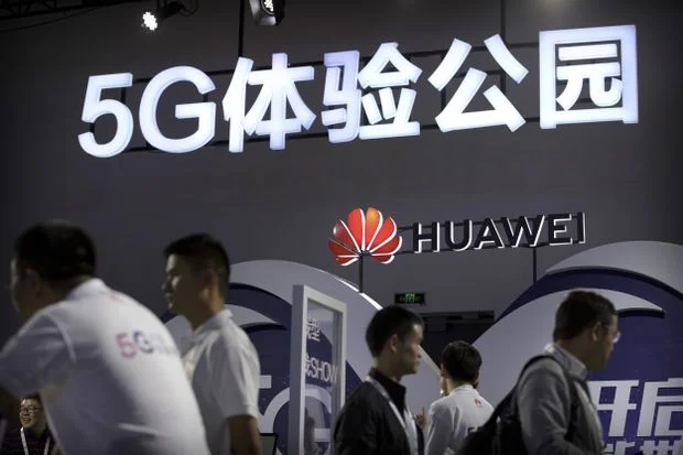 Huawei’s 5G technology display booth at the PT Expo held in Beijing, China, on Sept. 26, 2018. Photo: Mark Schiefelbein/AP