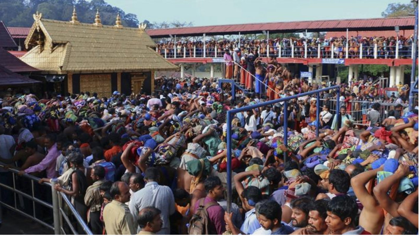 Thousands of devotees gather at the Sabarimala Temple in Kerala, India. Photo: Hareesh Kumar AS/AP.