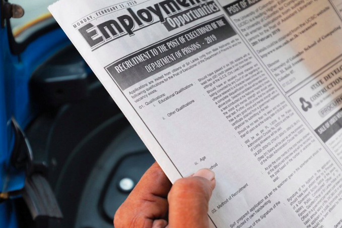 An advertisement attempting to recruit two hangmen in Colombo, Sri Lanka. Photo: Reuters , Dinuka Liyanawatte