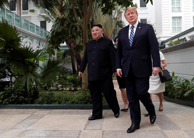 North Korean leader Kim Jong-un and US President Donald Trump walk in the garden of Hanoi’s Metropole hotel shortly before the abrupt termination of the summit on Feb. 28, 2019. Photo: Leah Millis/Reuters