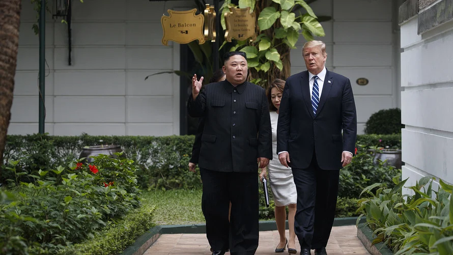 United States President Trump and North Korean Supreme Leader Kim Jong-un walk side-by-side during their summit in Hanoi, Vietnam last week. Photo: AP