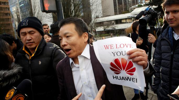 Supporters of Ms. Meng protested outside the Vancouver Courthouse where she was charged Photo: David Ryder/Reuters