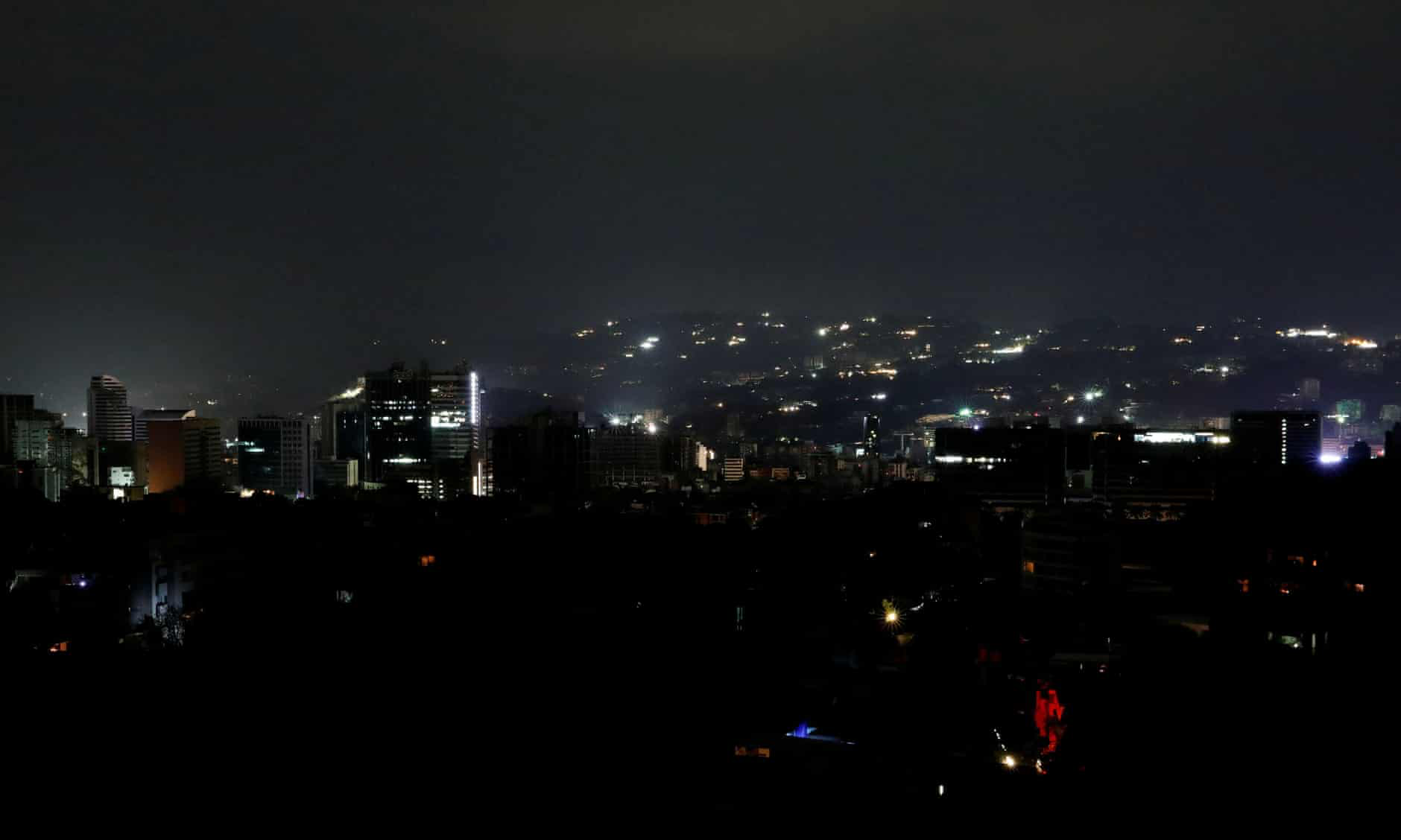 A view of Caracas, Venezuela’s capital city, during the blackout. Photo: Reuters via The Guardian .