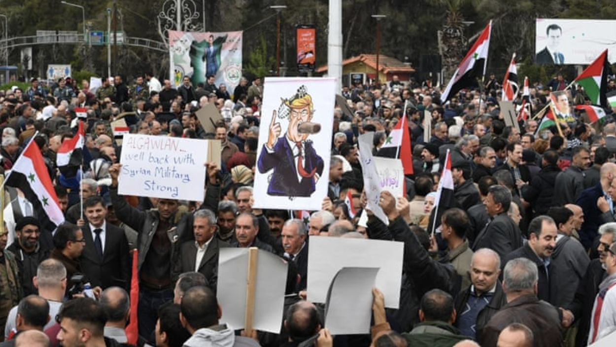 Syrians protest Trump’s declaration of Israeli sovereignty over the Golan Heights. Photo : Al Jazeera