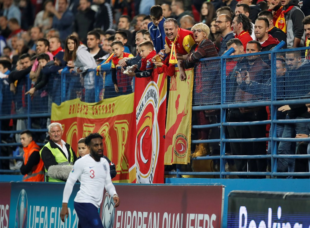 England’s Danny Rose playing in Montenegro amidst a crowd of Serbian fans. Photo: Carl Recine / Reuters .