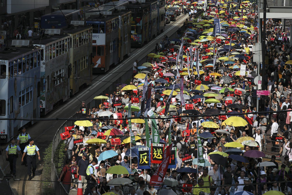 Demonstrators against proposed changes to Hong Kong’s extradition laws march through Causeway Bay on April 28, 2019. Photo: Robert Ng/South China Morning Post
