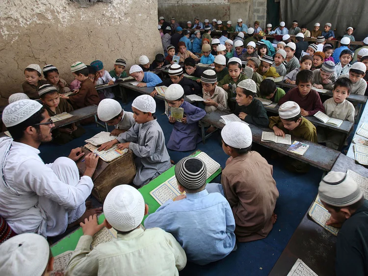 Students at a religious institution in Karachi, Pakistan; Photo: Gulf News/AP