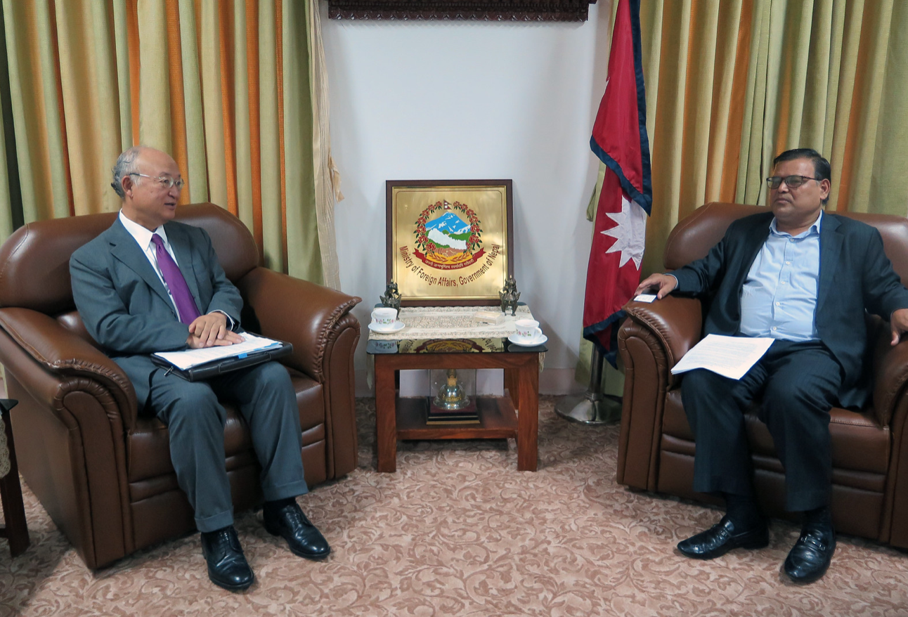 Krishna Bahadur Mahara (right) meeting with IAEA Director Yukiya Amano (left). Photo. Source: Flickr Images