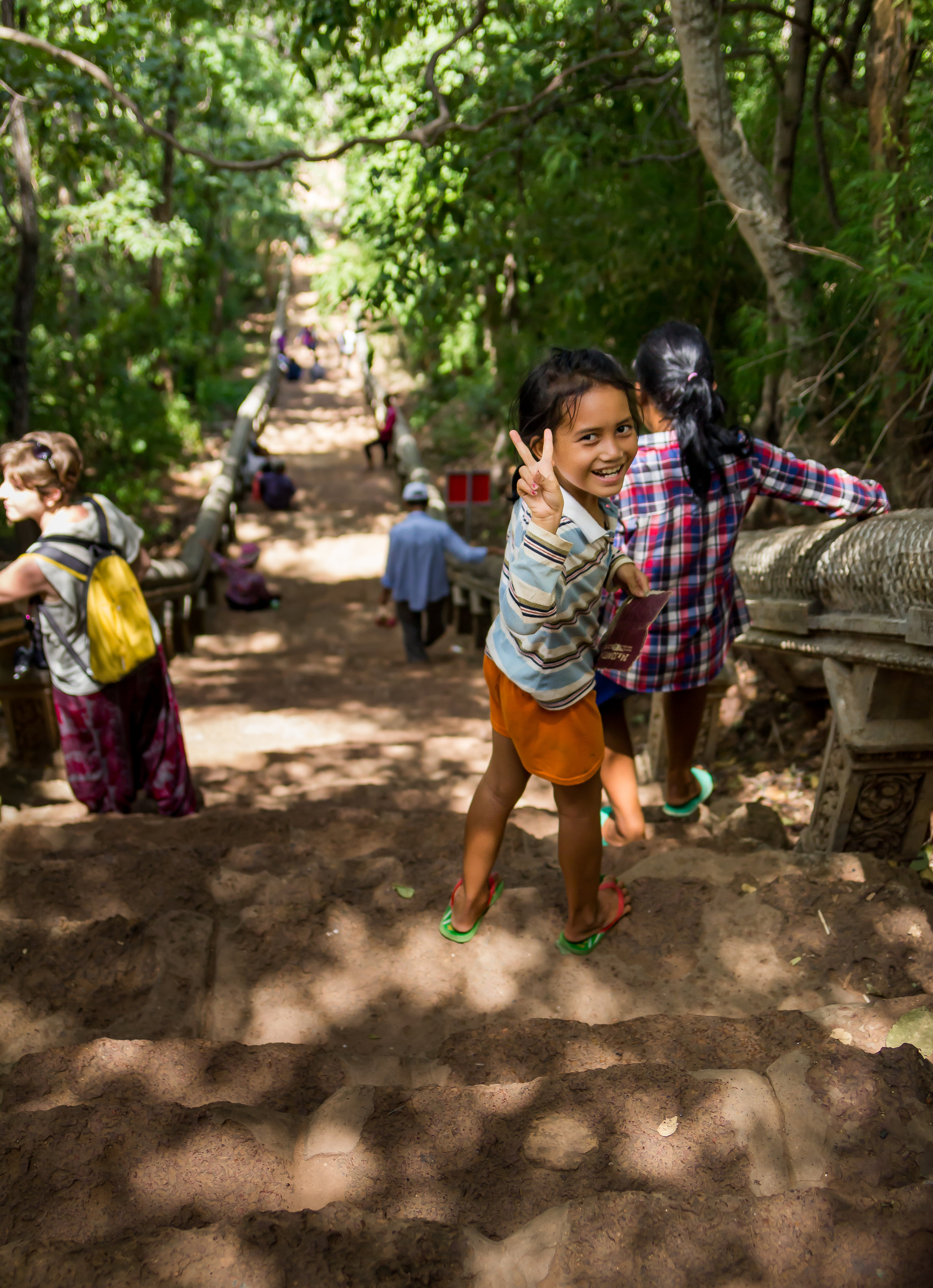 A cheeky girl by the temple - Cambodia, 2017