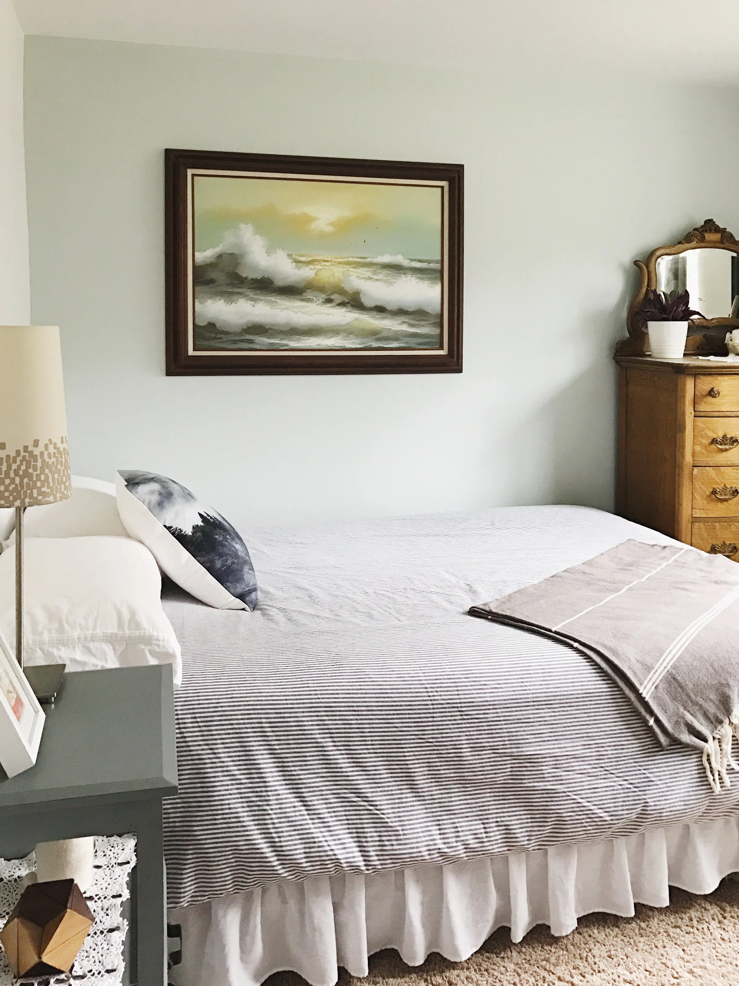 With all the times I've specified white wall paint for clients, this is actually the first time I've gone white white in my own space. I was hesitant to follow this trend that everyone and their mom seems to be doing these days, but... there really is something to be said about how nice clean, white walls look. The accent wall color is Sherwin Williams SW6204 Sea Salt. I selected this for a client over the summer and I liked it so much I decided to use it myself.