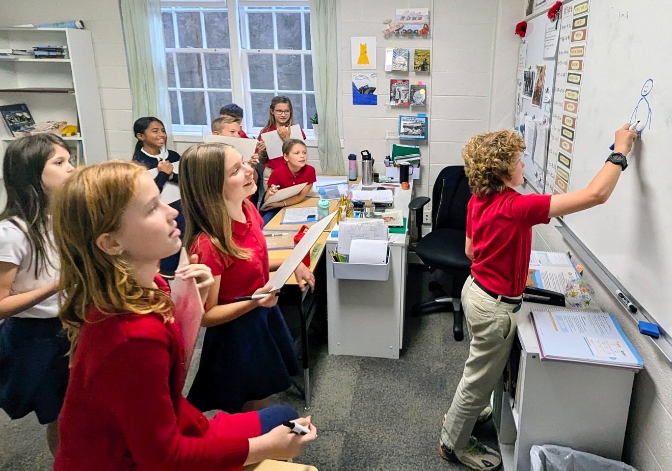 Our 4th graders love to warm up and review for Latin by playing their ever-favorite Latin Pictionary! 🎉