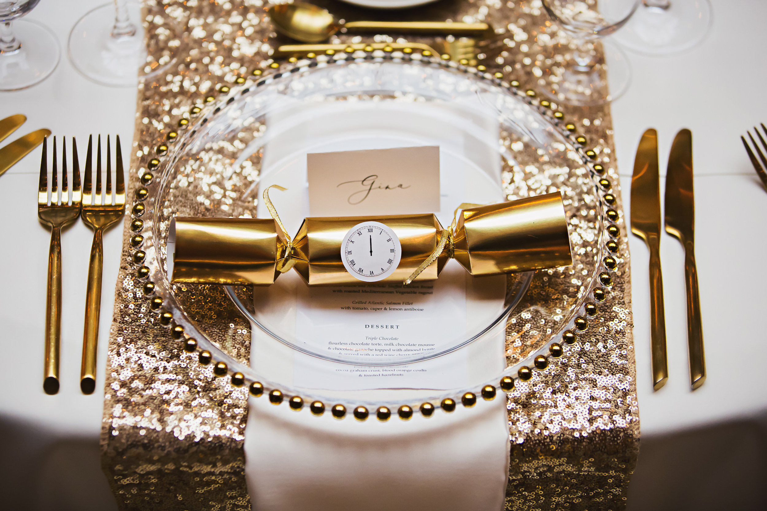 Could you think of a better wedding favour than holiday crackers? They were filled with Hershey’s kisses…so no one went without a kiss at midnight! I was drooling over the gold cutlery (now on my "need in my own house” list).