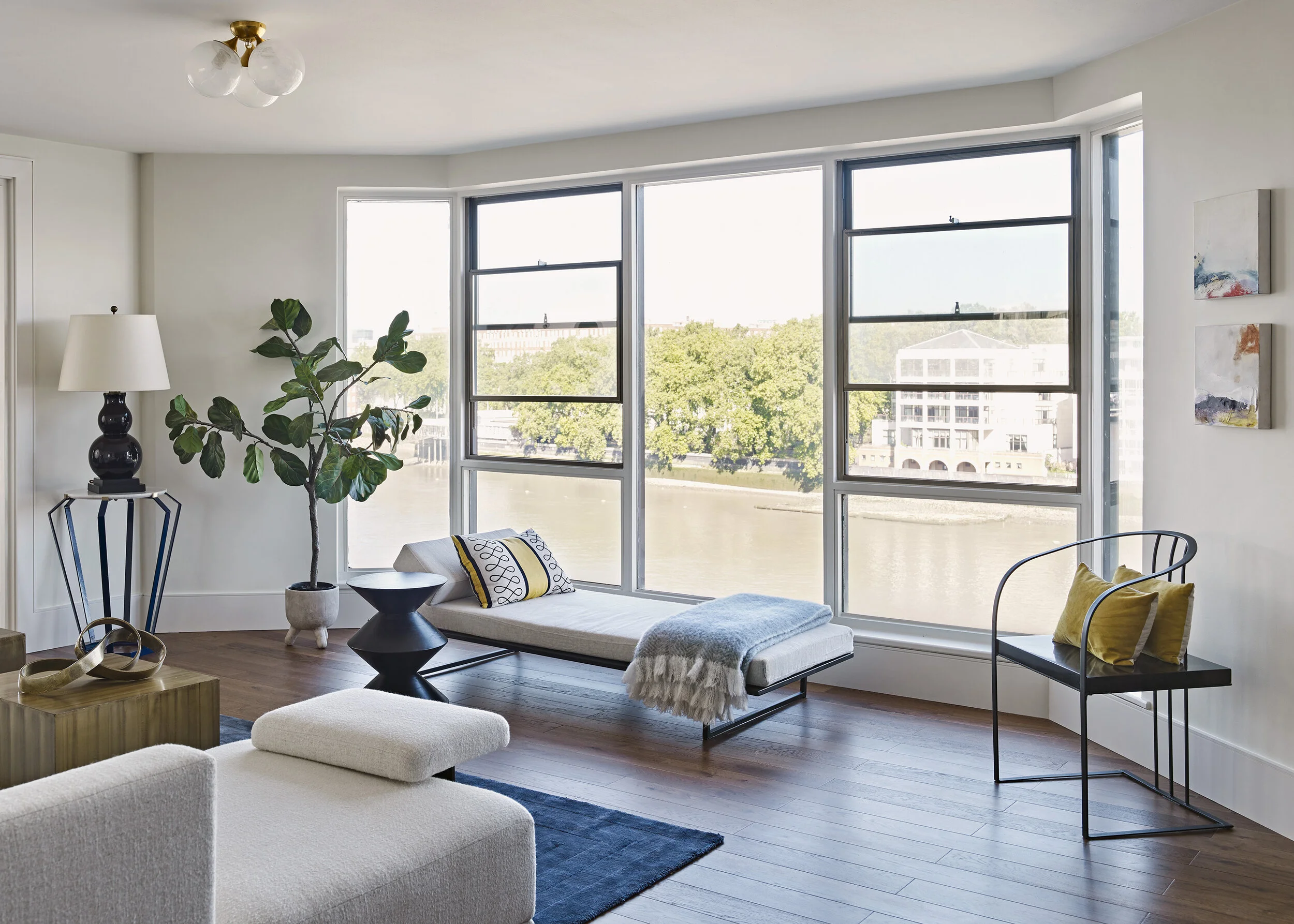   “Schoolhouse White” which is a soft off-white by Farrow and Ball, was used in the open-plan room to soften the glare of the reflection of the sun that would come off of The Thames on a bright day.  