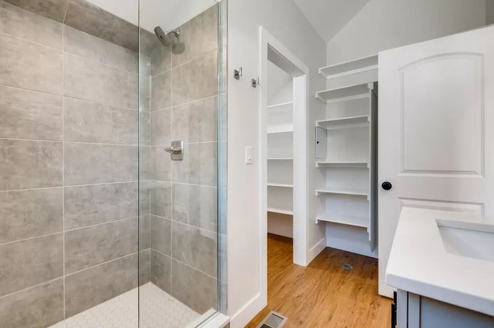 BATHROOM WITH VIEW OF WALK-IN CLOSET
