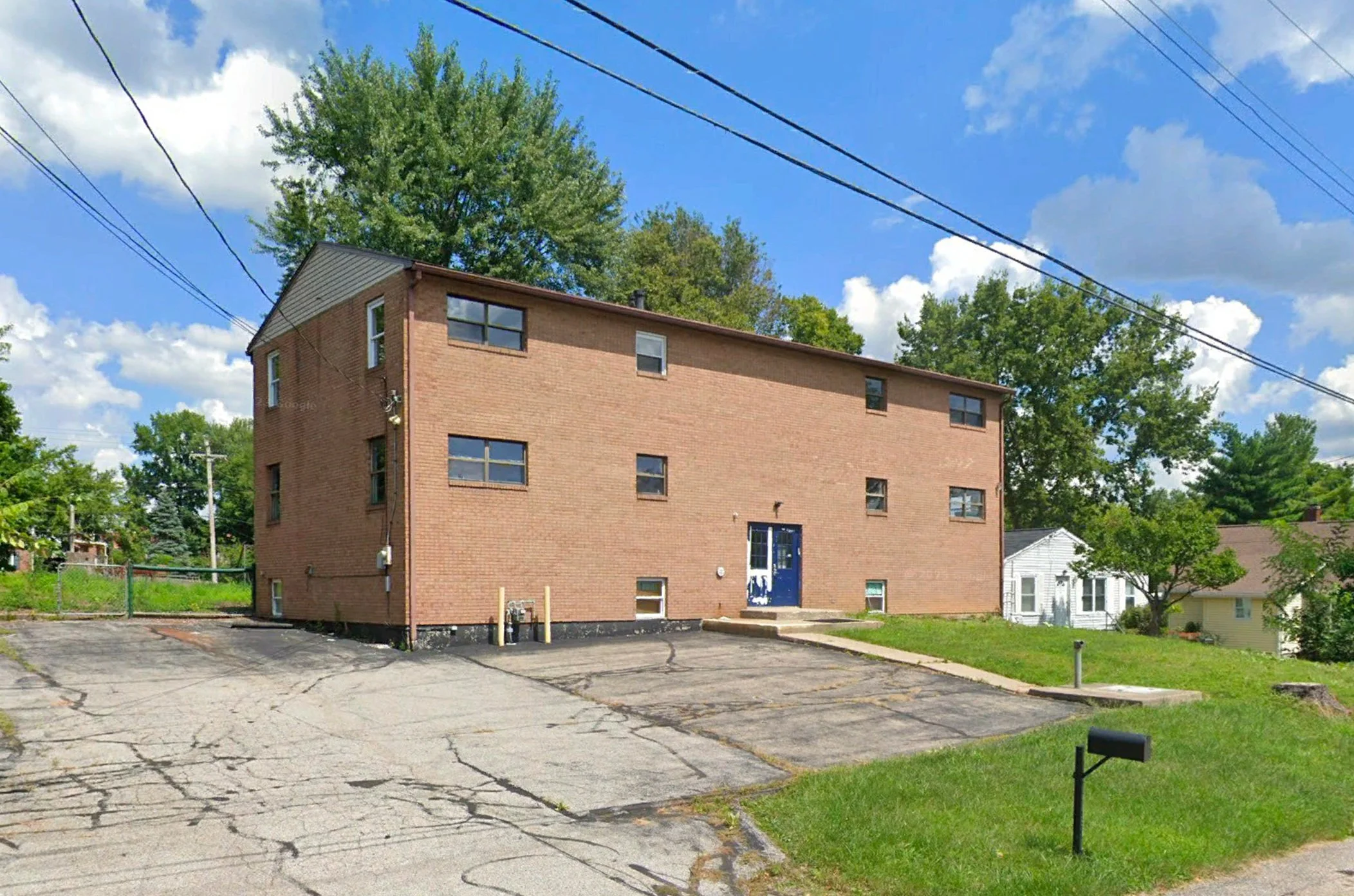 An existing three story building originally designed as a daycare building. Re-designed as a six-unit apartment building.