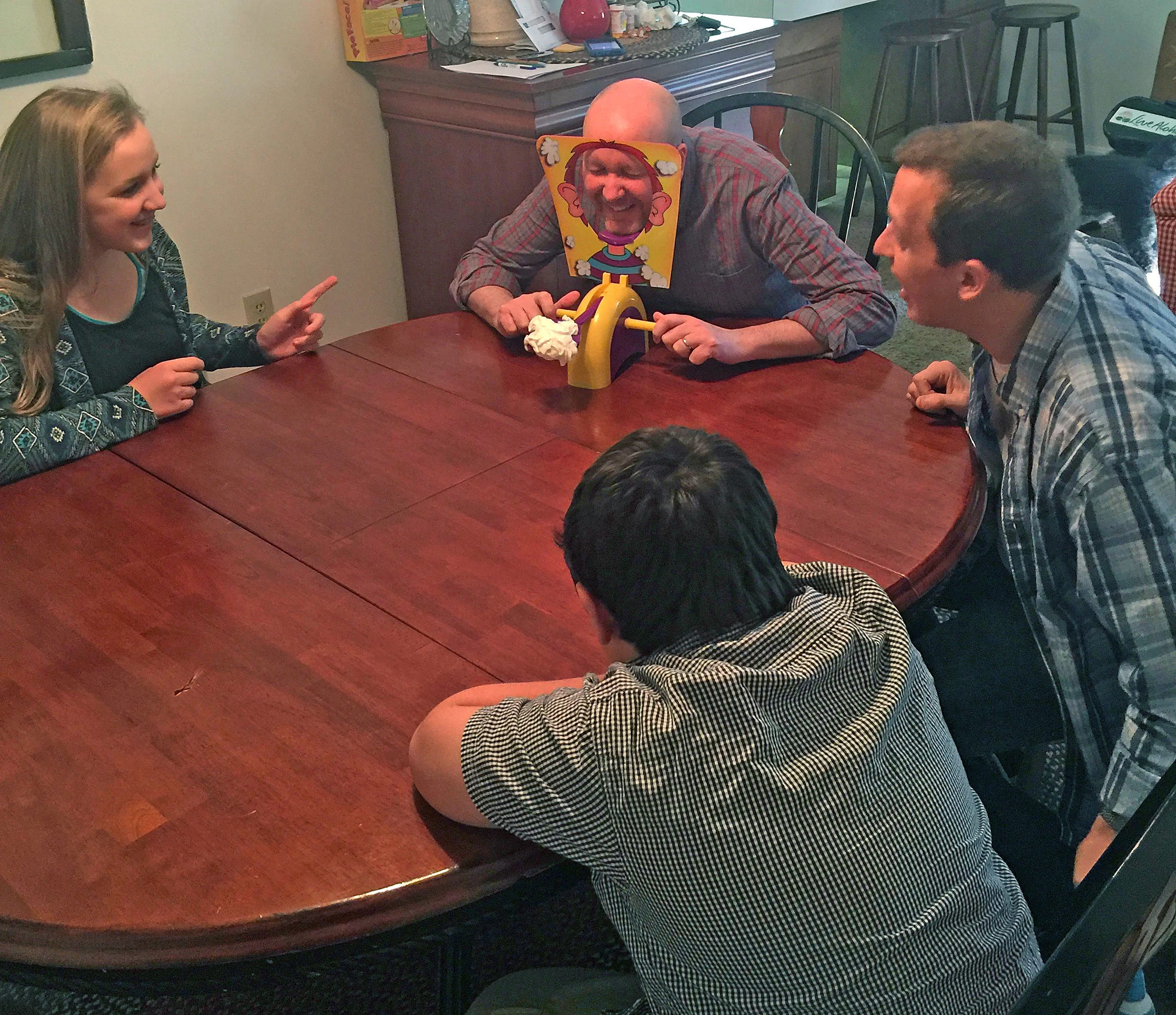 Playing the Pie Face game with our nephew, Bryson
