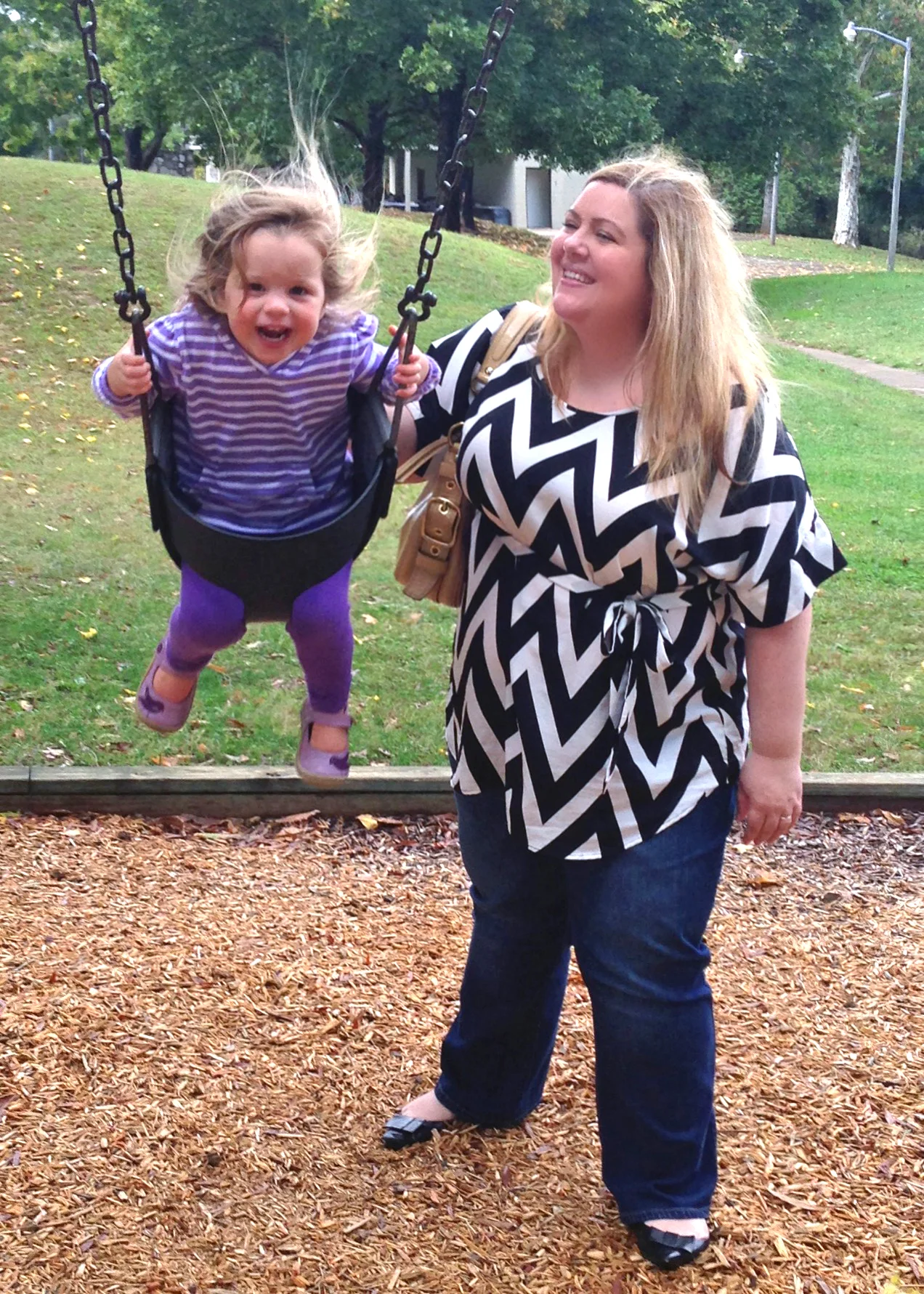 Maggie loves to swing with aunt Emily