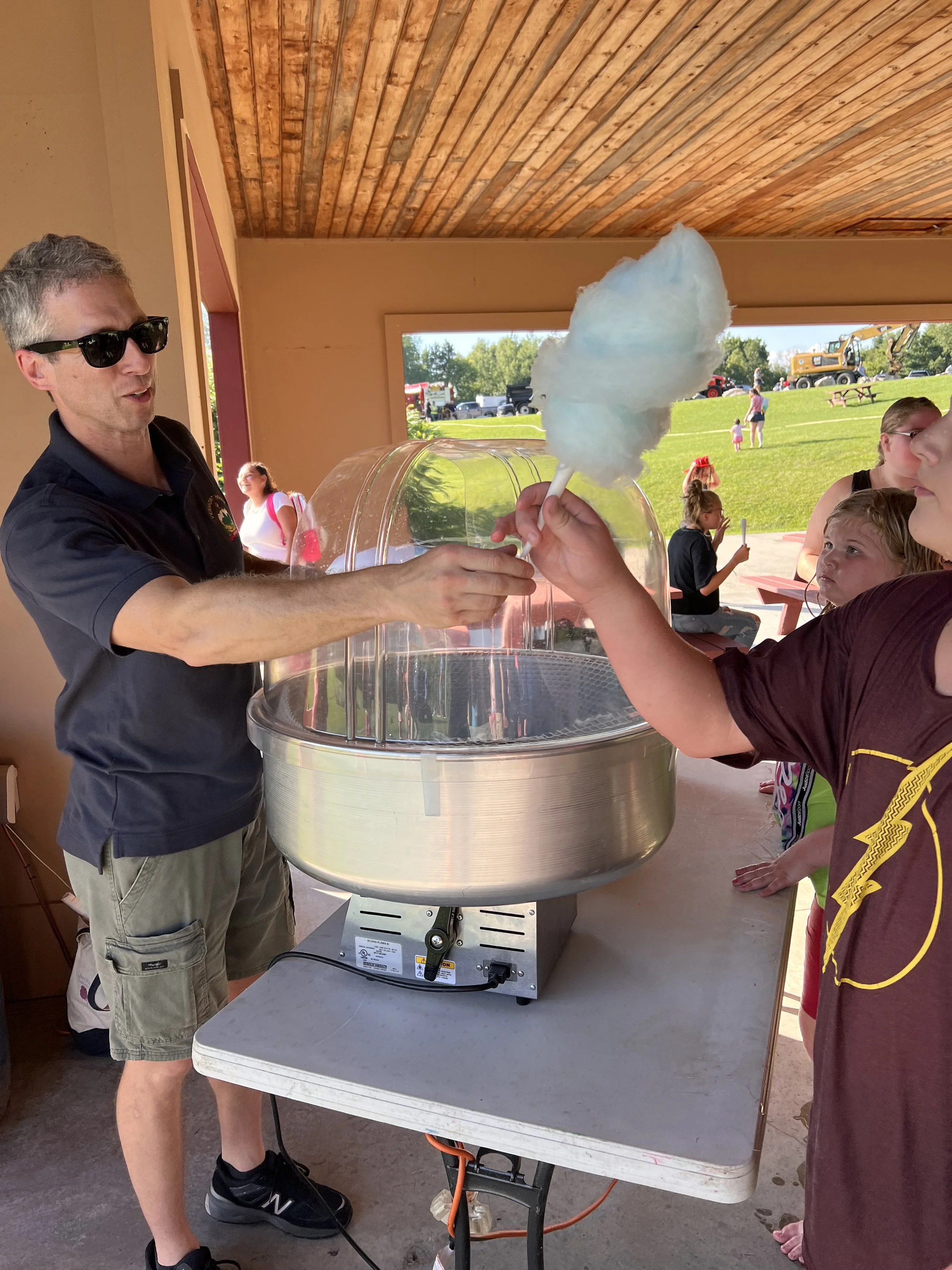 Unique job photo: handing out cotton candy a local family fun day.jpg