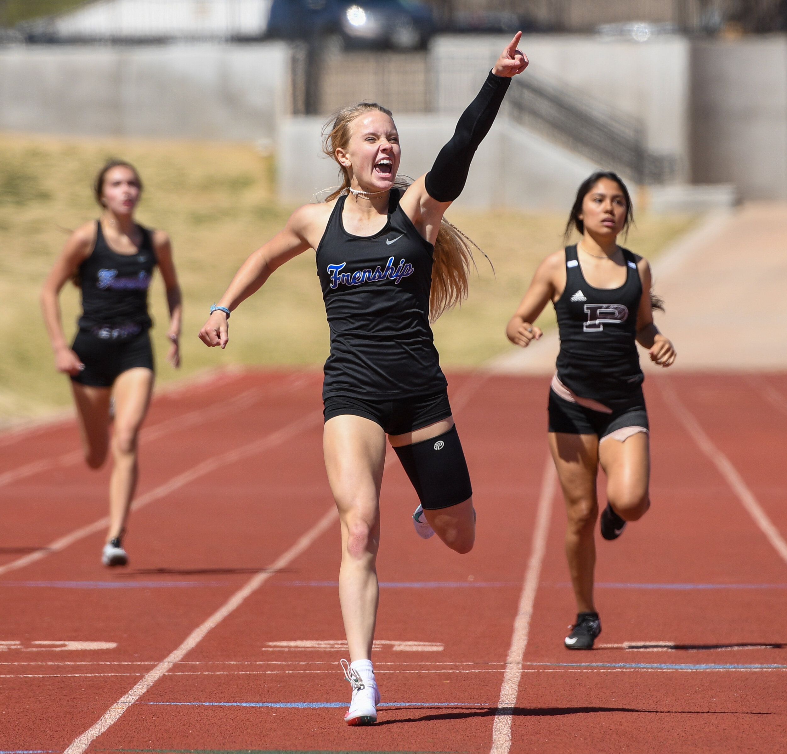  Frenship’s Jillian Cowart comes in first place on the 400-meter dash during the Lubbock Invitational track meet on Saturday, March 27, 2021, at Lowrey Field in Lubbock, Texas.  