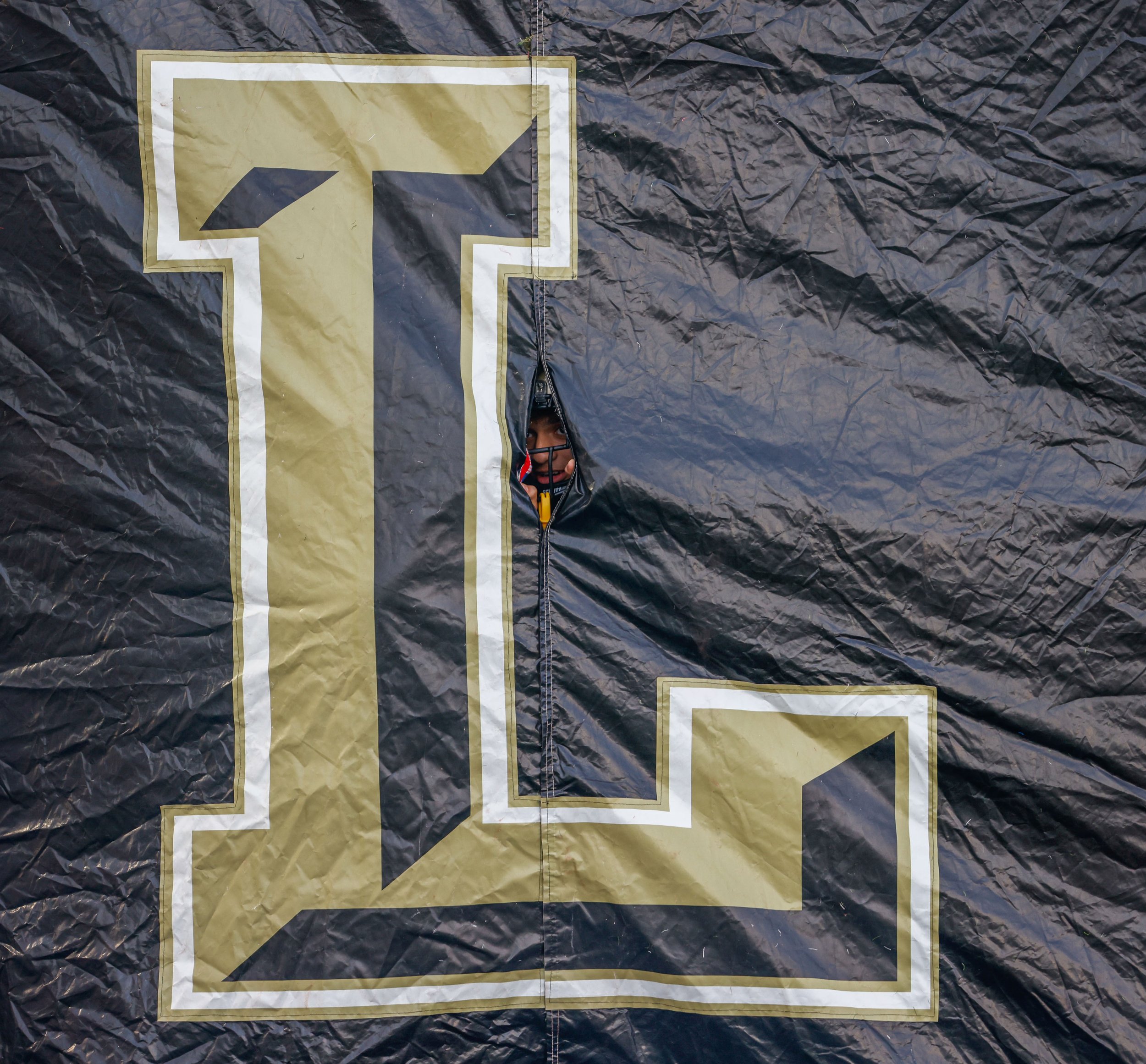  The Lubbock high school football team waits to run out of their tunnel before a high school football game on Thursday, Sept. 30, 2021 in Lubbock, Texas.  