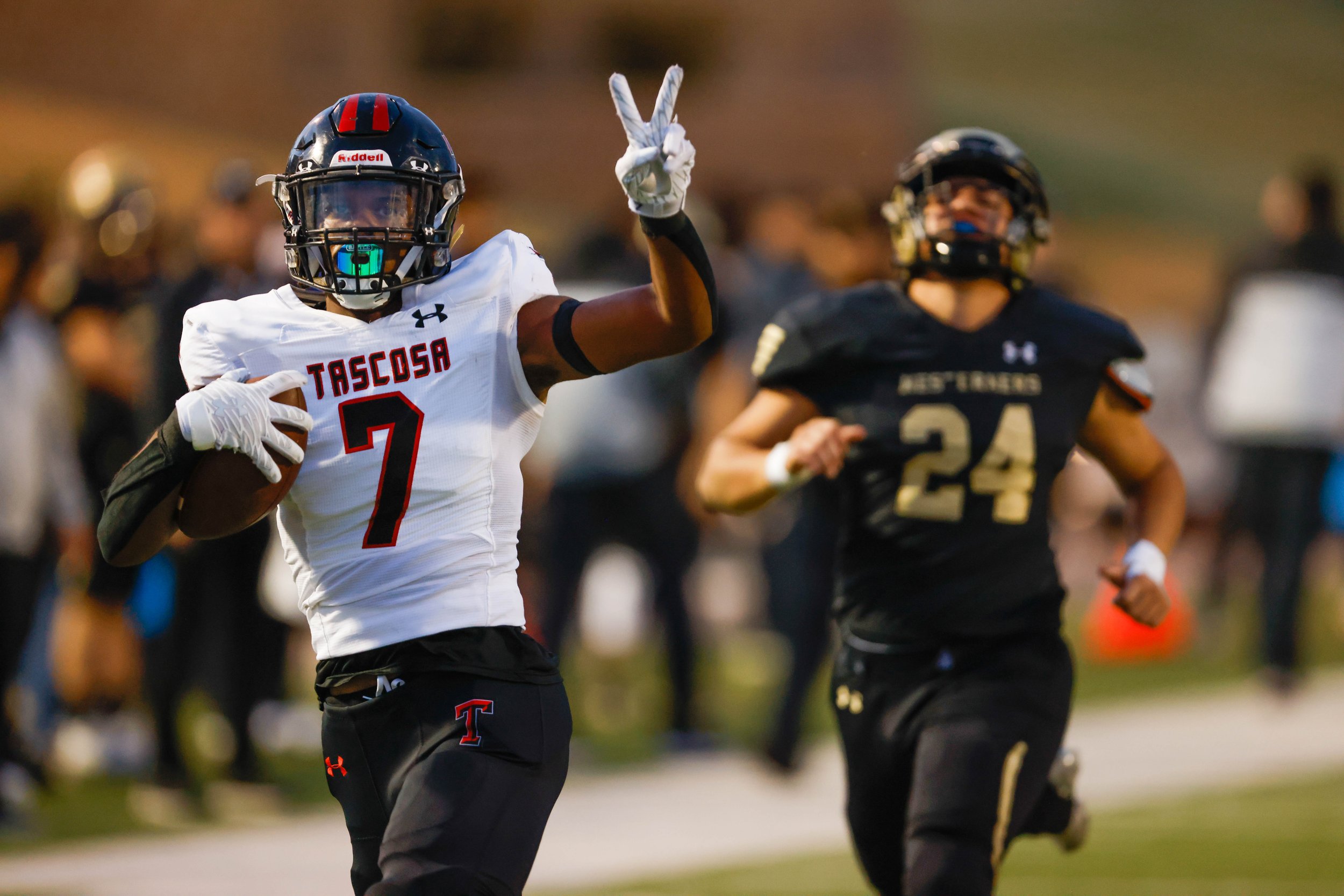  Tascosa’s Brenyn Barnes (7) celebrates a pick-six during the team’s high school football game against Lubbock on Thursday, Sept. 30, 2021 at Lowrey Field at PlainsCapital Park in Lubbock, Texas. 