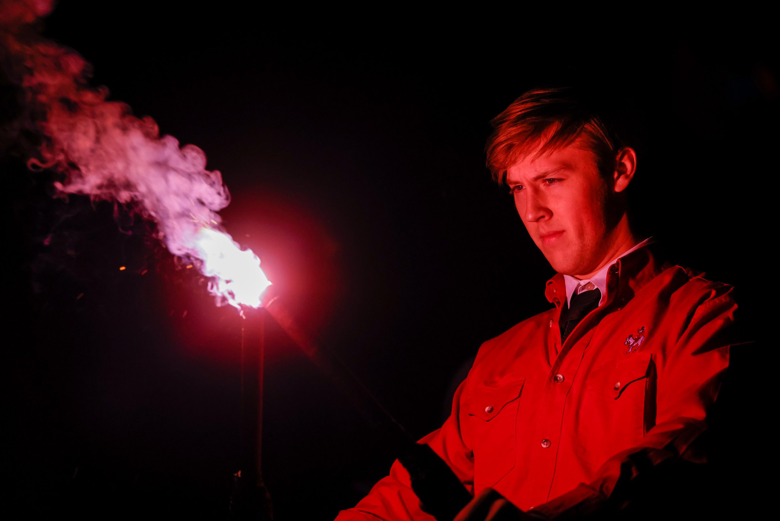 Saddle Tramps light torches to kick off the Carol of Lights ceremony on Tuesday, Nov. 30, 2021 at Memorial Circle on the Texas Tech campus in Lubbock, Texas. 