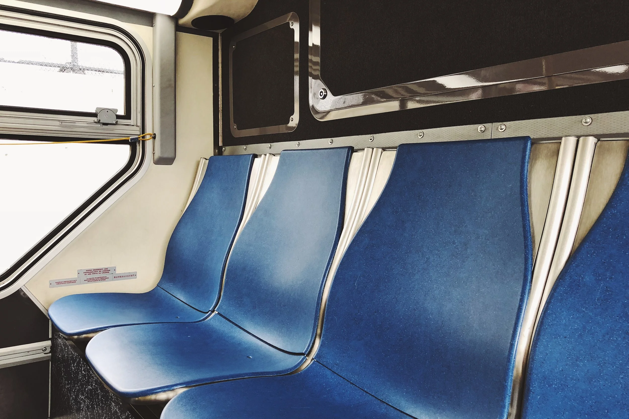 To the back of the bus. 