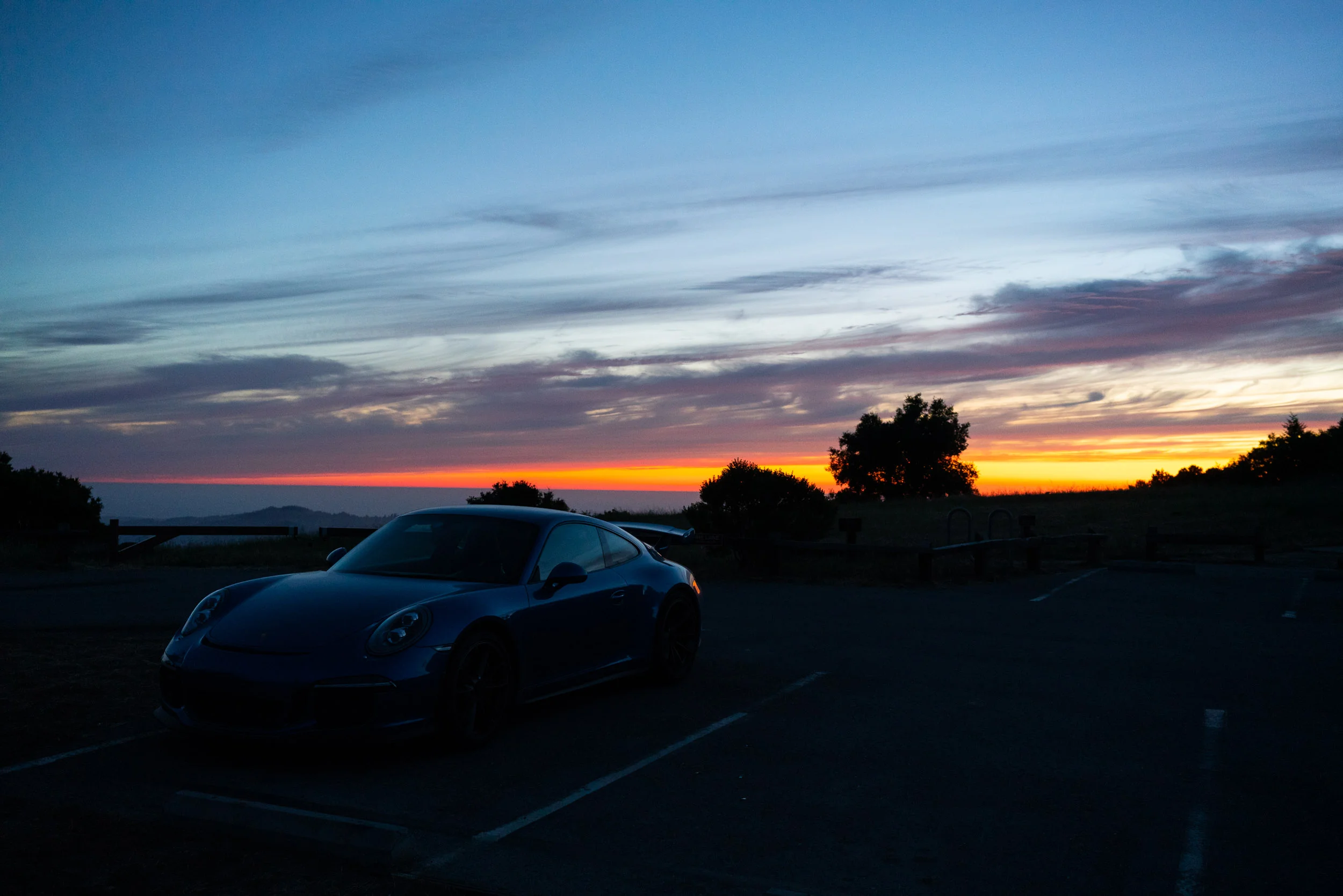 porsche-911-gt3-sunset-audrey-c-rust-commemorative-site-parking.jpg