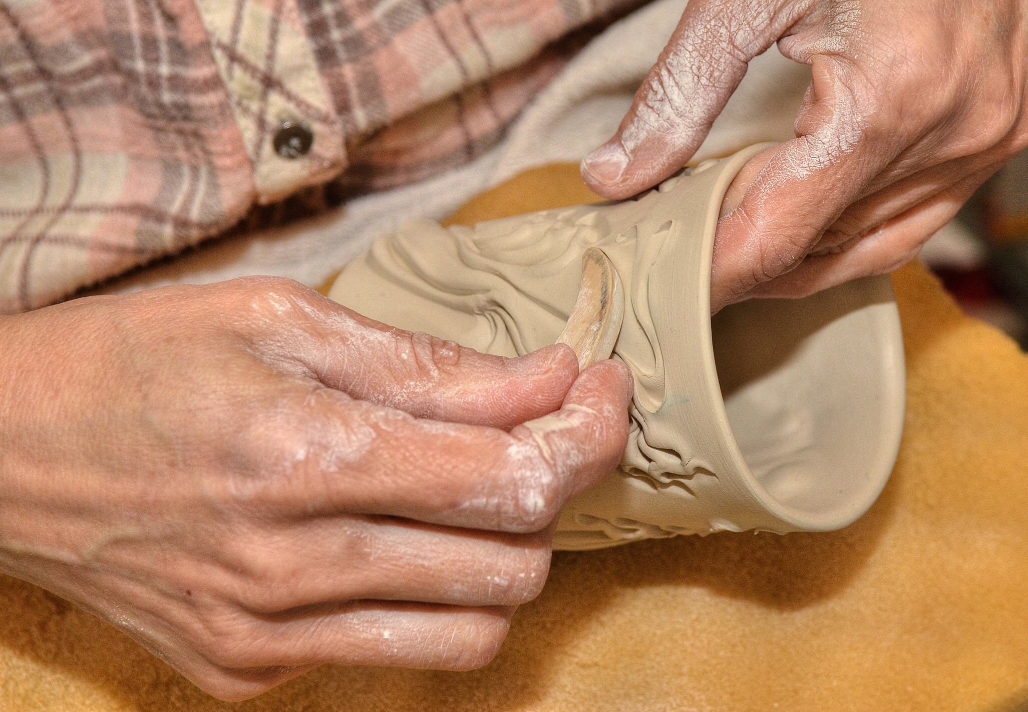 Lora Rust Ceramics Pushing the Clay.jpg