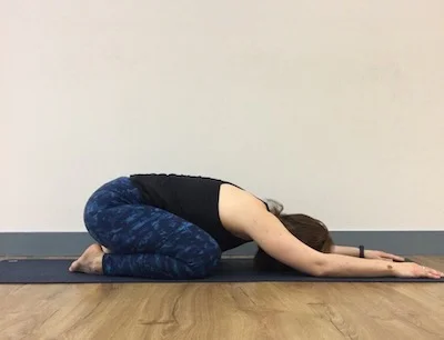 You can also tuck the arms alongside the legs here for an even more shoulder releasing option.