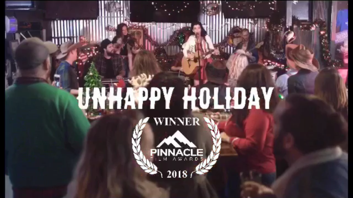 Best Music Video Award for "Unhappy Holiday" in Pinnacle Film Awards!