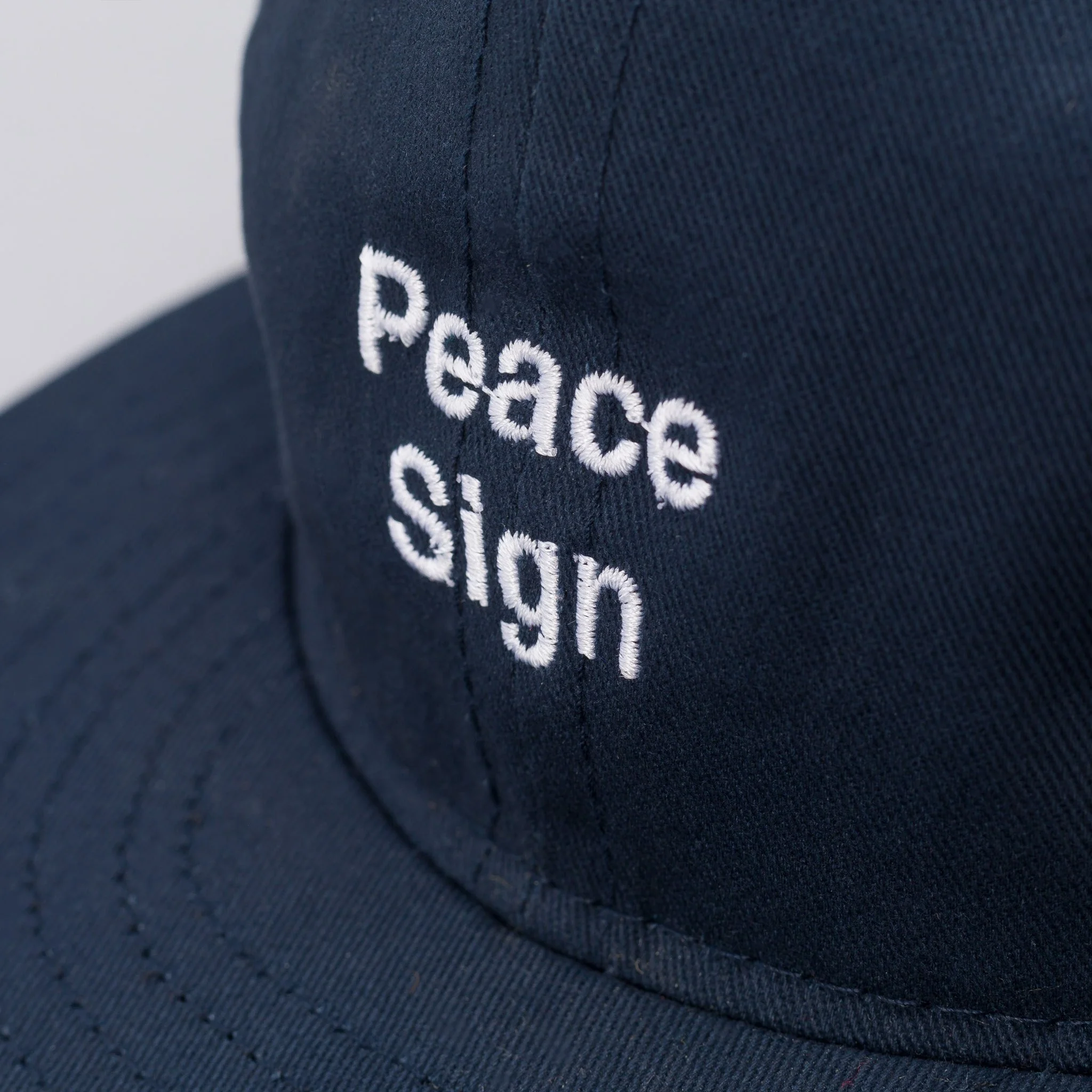 NOTRE-CHICAGO-MISTER-GREEN-PEACE-SIGN-CAP-FADED-NAVY-2843_2048x2048.jpg