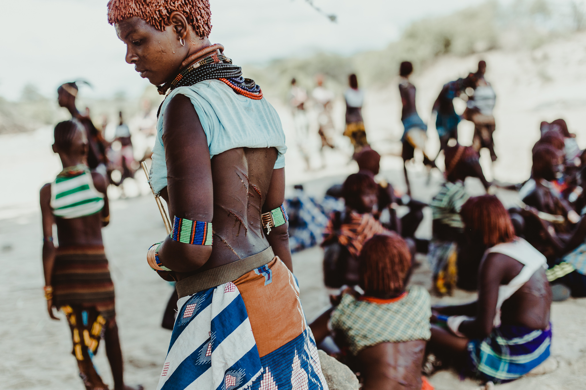 The Hamar women are often recognized for their ochre colored hair. Each hairstyle represents their current status (single, engaged, or married) and will often be decorated with ochre that’s been made into a paste.