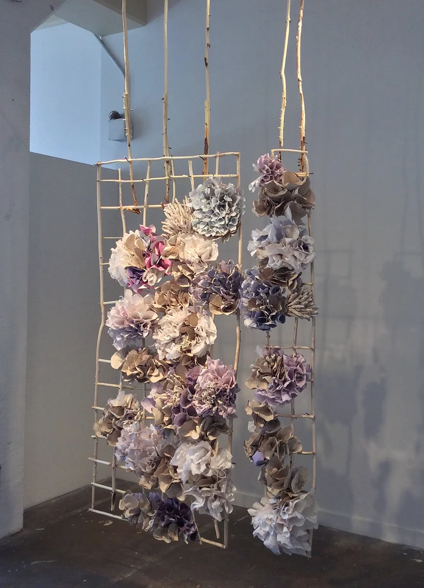 Swinging Bloom Fired and unfired porcelain paper clay, handmade paper, organic material 15' x 7' x 12"