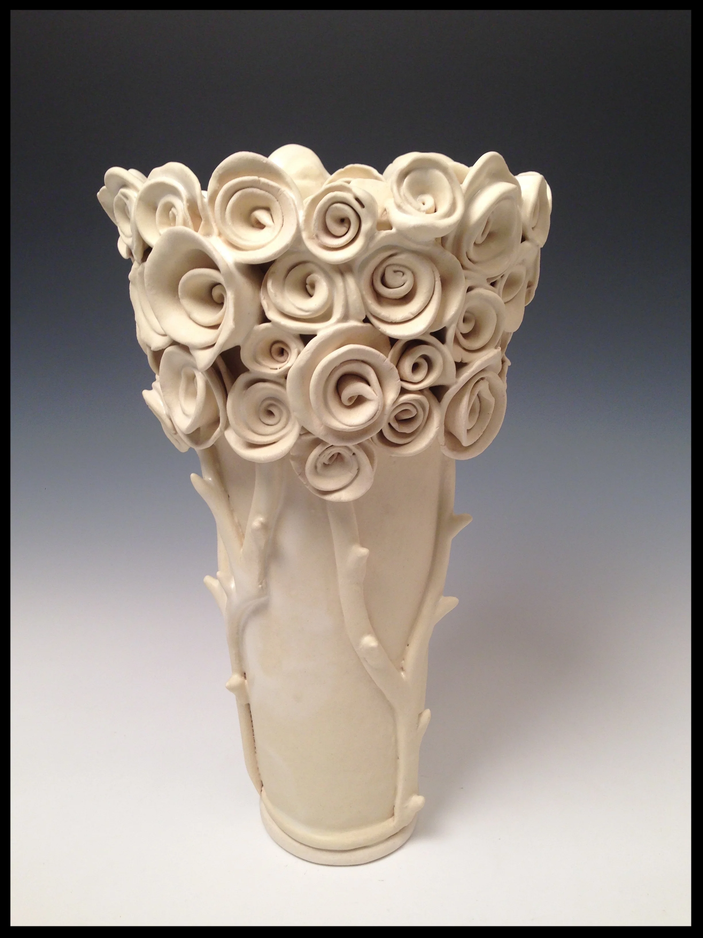 white rose vase