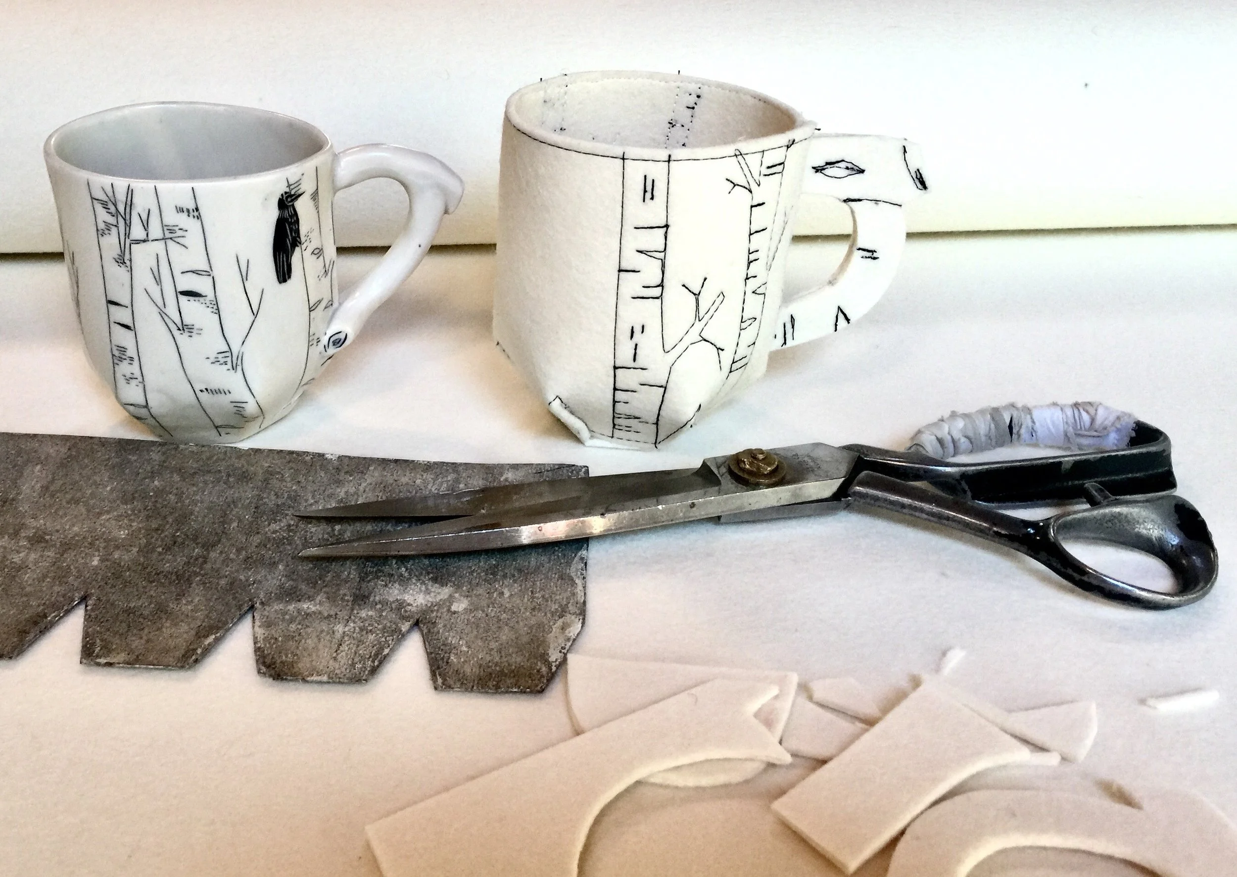 Contrast of clay and felt... felt birch cup in process.