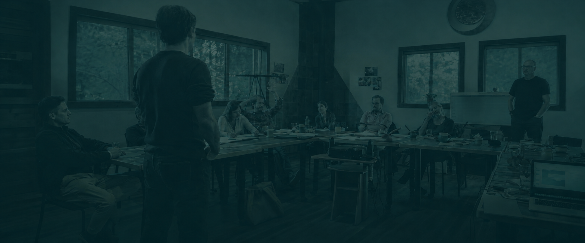 Exember Website.About Hero Header.Daniel facilitating.png