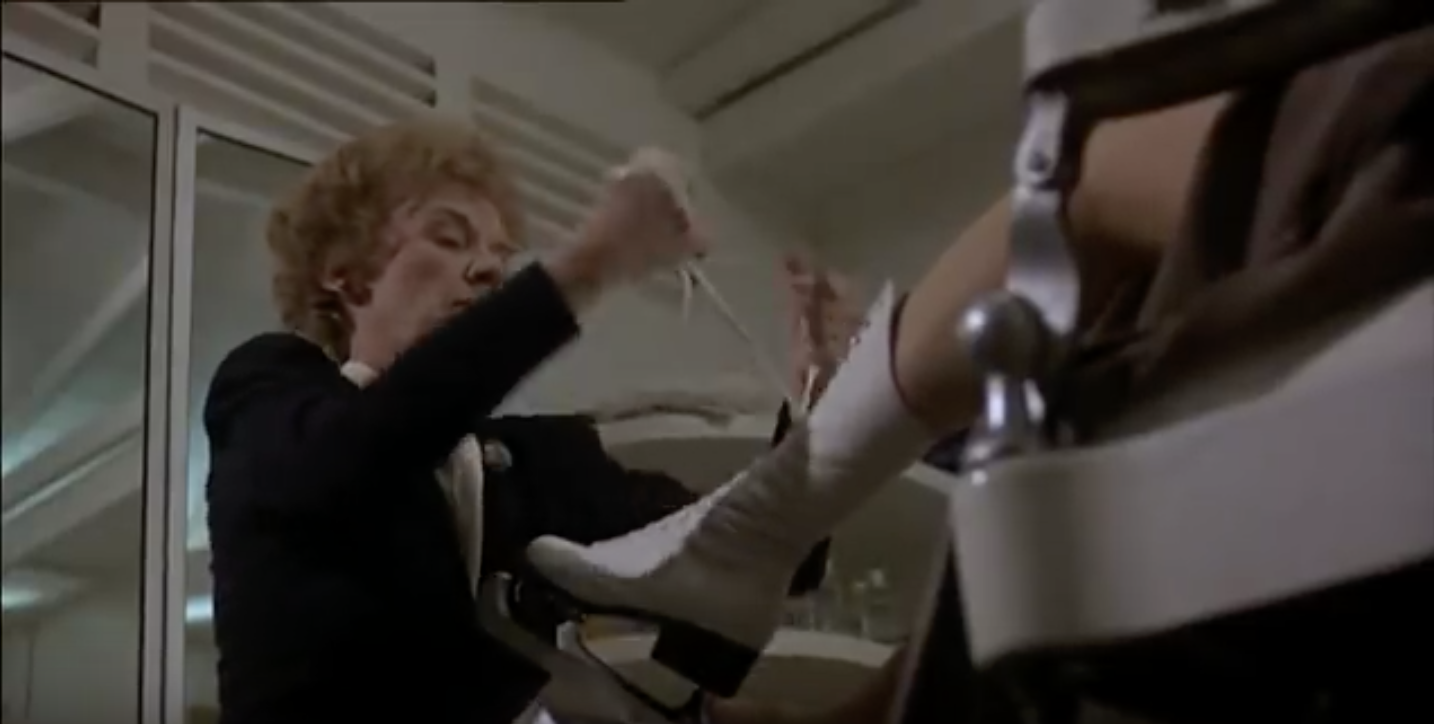 Joan getting laced up… so she can skate for literally the first 10 seconds of a scene.