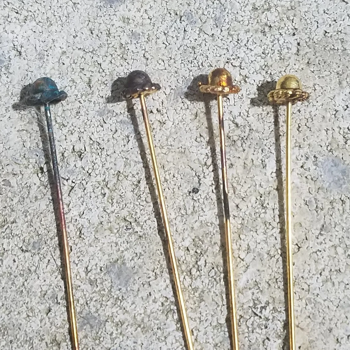 I had to practice washing the patina off immediately after application, or else the head pins looked like the one on the left, while I wanted the one on the right!