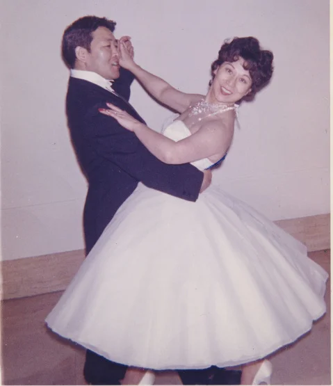 Ken and Miye Ota began dancing through the Arthur Murray school.