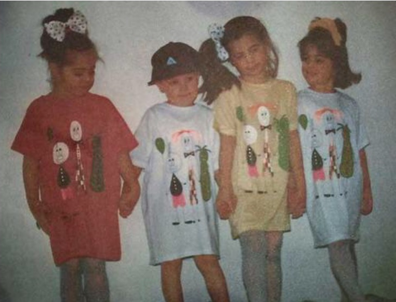 Gabriella, her sisters, and a friend, wearing her mother’s designs back in the day!