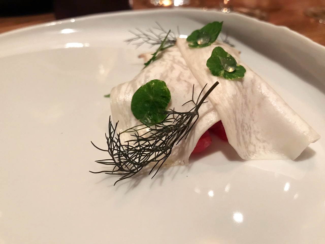  Tartare of bluefin tuna otoro, pickled mushroom shavings, and nasturtium 