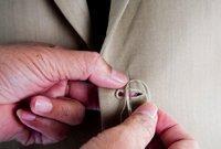7. Forward construction: Structural work is carried out on the coat by the tailor in preparation for the second fitting.