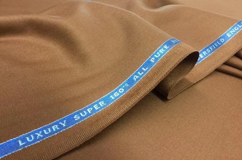 De Oost Bespoke Tailoring Bateman Ogden Collection Elite Suit Jacket Trousers Fabrics.jpg