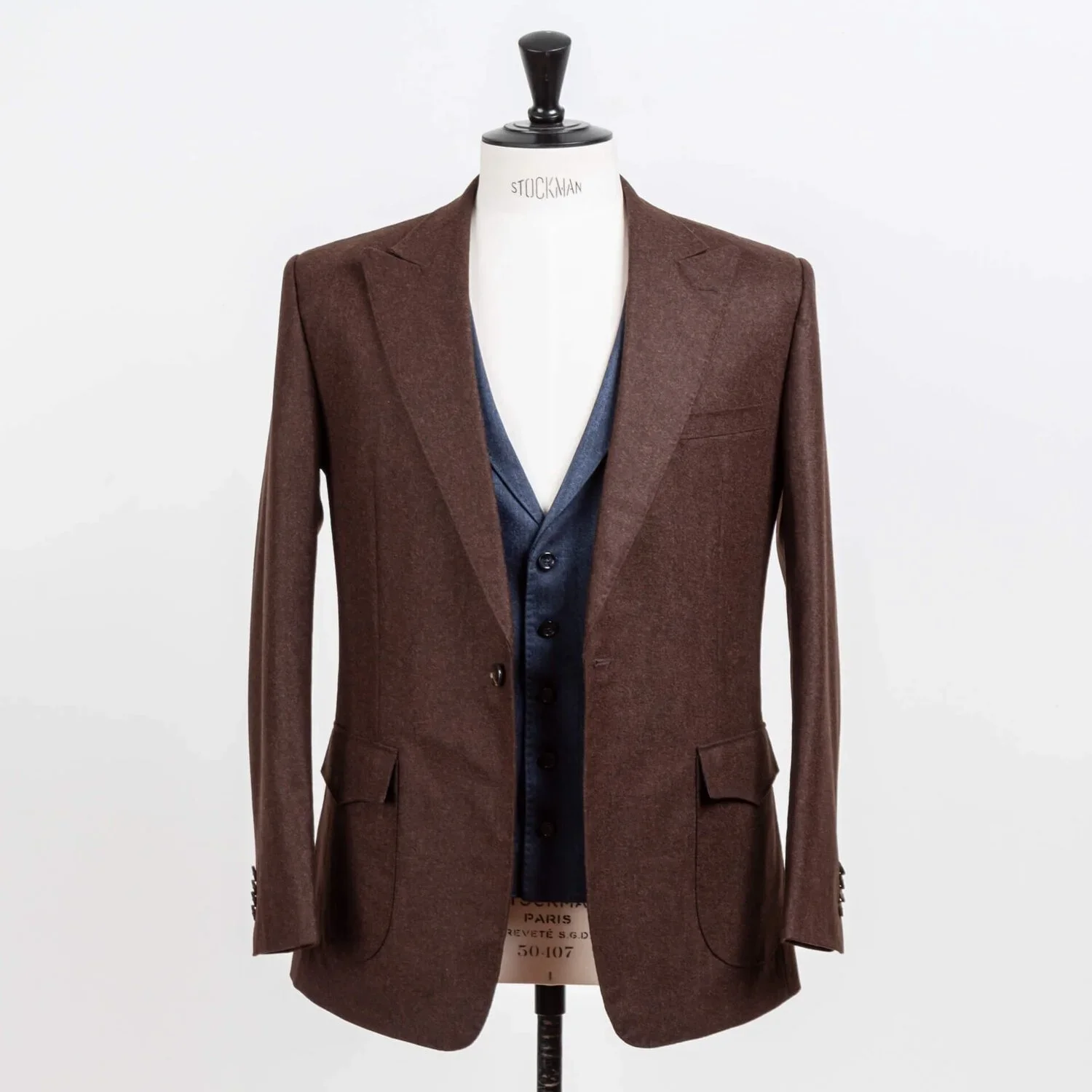 Bruin flannel colbert open gedragen met denim blauw herringbone gilet