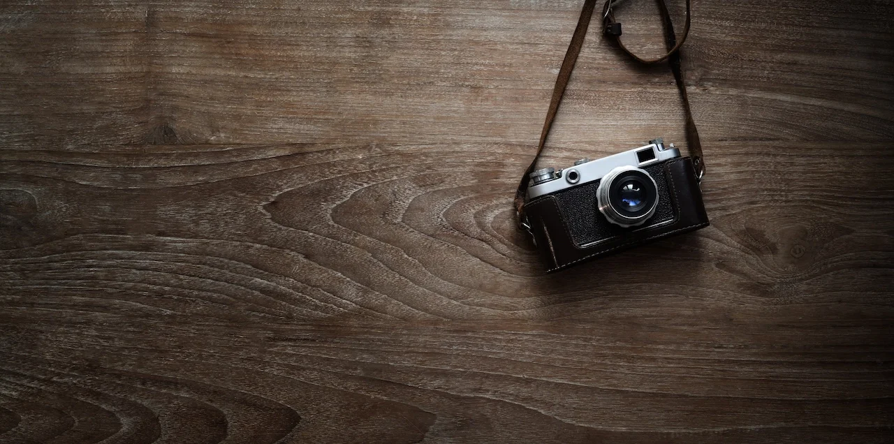 LR_adjustment_high-angle-view-camera-table copy 2.webp