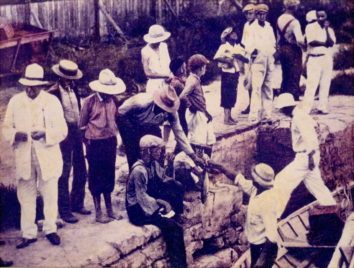 Teddy, young boy in the cap, center shot.