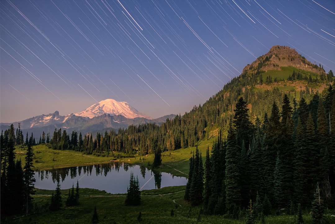 A full-moon timelapse of the night sky above Tipsoo Lake, Mount Rainier, and Yakima Peak.