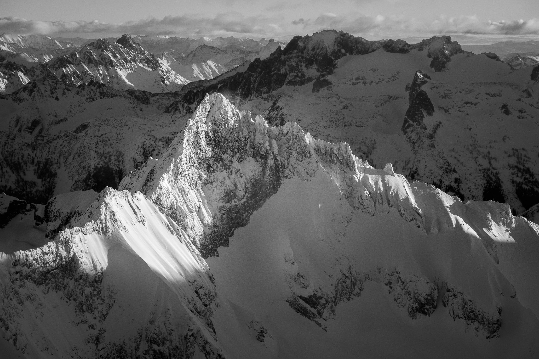  The south face of Forbidden Peak, with Logan and the Ragged Ridge of NCNP in the morning light. 