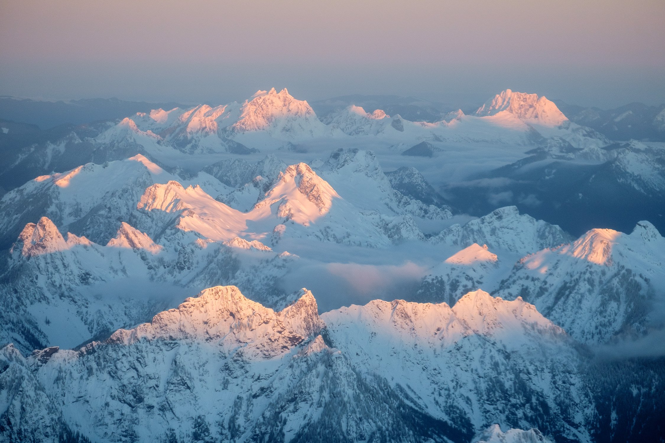  An aerial view of Gothic, Delcampo, Three Fingers and Whitehorse on a sunrise flight over the Cascades in January. 